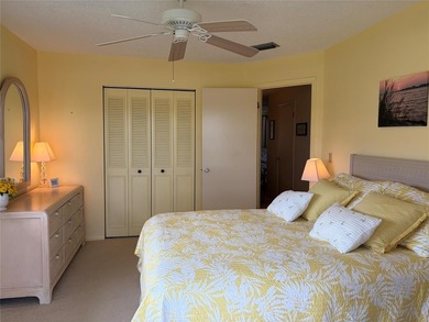 Beautiful Lake and Golf Course Views From This Two Bedroom / Two on The American Golf Club in Florida - for sale on GolfHomes.com, golf home, golf lot