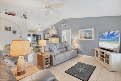 This beautifully updated home invites you to step right in and on Rotonda Golf and Country Club The Palms Course in Florida - for sale on GolfHomes.com, golf home, golf lot