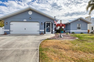 This beautifully updated home invites you to step right in and on Rotonda Golf and Country Club The Palms Course in Florida - for sale on GolfHomes.com, golf home, golf lot