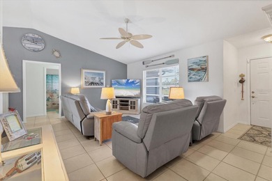 This beautifully updated home invites you to step right in and on Rotonda Golf and Country Club The Palms Course in Florida - for sale on GolfHomes.com, golf home, golf lot