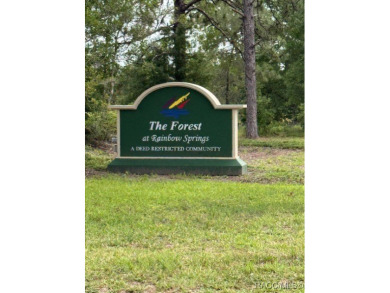 Discover the perfect blend of privacy and convenience with this on Rainbow Springs Golf and Country Club in Florida - for sale on GolfHomes.com, golf home, golf lot