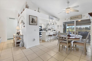 This beautifully updated home invites you to step right in and on Rotonda Golf and Country Club The Palms Course in Florida - for sale on GolfHomes.com, golf home, golf lot