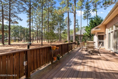 Lovely one level brick cottage on 14th hole of the Holly Course on Pinewild Country Club of Pinehurst in North Carolina - for sale on GolfHomes.com, golf home, golf lot