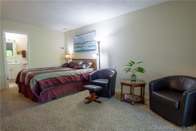 Welcome to your perfect retreat in the iconic Tan Tar A on The Oaks Golf Course in Missouri - for sale on GolfHomes.com, golf home, golf lot