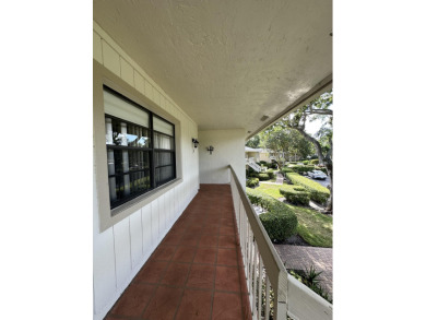 Corner unit on second floor with nice size patio to relax with on Hunters Run Golf and Country Club in Florida - for sale on GolfHomes.com, golf home, golf lot