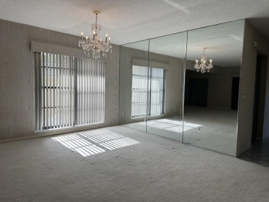 Corner unit on second floor with nice size patio to relax with on Hunters Run Golf and Country Club in Florida - for sale on GolfHomes.com, golf home, golf lot