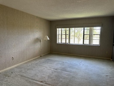 Corner unit on second floor with nice size patio to relax with on Hunters Run Golf and Country Club in Florida - for sale on GolfHomes.com, golf home, golf lot