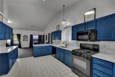 Experience golf course living at its finest in this stunning on Los Prados Golf Course in Nevada - for sale on GolfHomes.com, golf home, golf lot