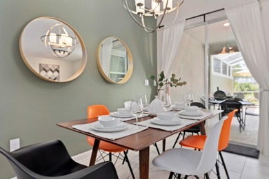 INCOME READY INVESTMENT OPPORTUNITY!! 4 bedroom/3 bath POOL home on ChampionsGate Golf Resort in Florida - for sale on GolfHomes.com, golf home, golf lot