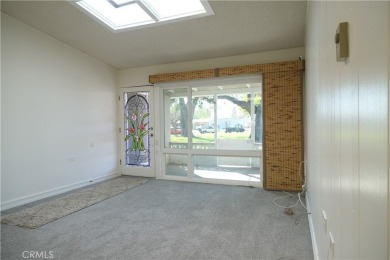 Mutual 1-69K is a lovely west facing unit with an adorable on Leisure World Seal Beach Golf Course in California - for sale on GolfHomes.com, golf home, golf lot