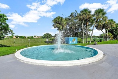 Welcome home to this Resort-style living very spacious 1st-floor on Inverrary Country Club in Florida - for sale on GolfHomes.com, golf home, golf lot