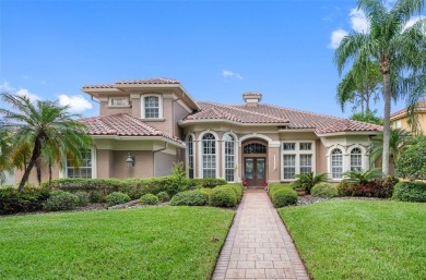 This custom designed 4 bed / 4 bath / 3 car garage home is on Bayou Golf Club in Florida - for sale on GolfHomes.com, golf home, golf lot