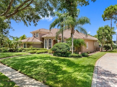 This custom designed 4 bed / 4 bath / 3 car garage home is on Bayou Golf Club in Florida - for sale on GolfHomes.com, golf home, golf lot