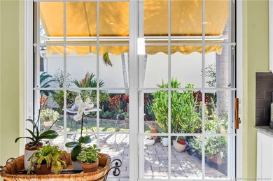 Peace and serenity abound in this meticulously maintained on Lost Lake Golf Club in Florida - for sale on GolfHomes.com, golf home, golf lot