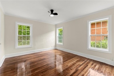 This charming, updated 2-bedroom, 1-bath home offers a rare on John A. White Golf Course in Georgia - for sale on GolfHomes.com, golf home, golf lot