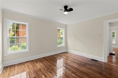 This charming, updated 2-bedroom, 1-bath home offers a rare on John A. White Golf Course in Georgia - for sale on GolfHomes.com, golf home, golf lot