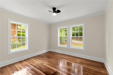 This charming, updated 2-bedroom, 1-bath home offers a rare on John A. White Golf Course in Georgia - for sale on GolfHomes.com, golf home, golf lot