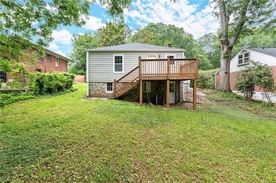 This charming, updated 2-bedroom, 1-bath home offers a rare on John A. White Golf Course in Georgia - for sale on GolfHomes.com, golf home, golf lot