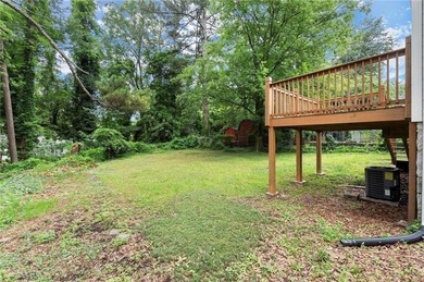 This charming, updated 2-bedroom, 1-bath home offers a rare on John A. White Golf Course in Georgia - for sale on GolfHomes.com, golf home, golf lot