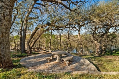 Welcome to your new riverfront home nestled in the prestigious on Pecan Plantation Country Club in Texas - for sale on GolfHomes.com, golf home, golf lot