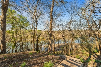 Welcome to your new riverfront home nestled in the prestigious on Pecan Plantation Country Club in Texas - for sale on GolfHomes.com, golf home, golf lot