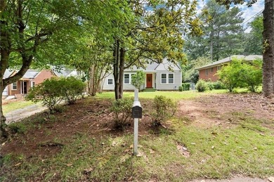 This charming, updated 2-bedroom, 1-bath home offers a rare on John A. White Golf Course in Georgia - for sale on GolfHomes.com, golf home, golf lot