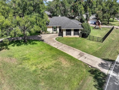 Welcome to 6103 Prospect Hill Drive, a beautifully maintained on Pecan Plantation Country Club in Texas - for sale on GolfHomes.com, golf home, golf lot