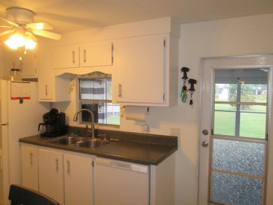 HUGE CORNER LOT PROPERTY WITH A PRIVATE DOCK & WITH A BEAUTIFUL on Cypress Creek Country Club - Boynton Beach in Florida - for sale on GolfHomes.com, golf home, golf lot