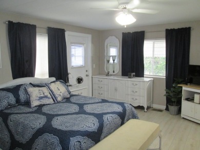 HUGE CORNER LOT PROPERTY WITH A PRIVATE DOCK & WITH A BEAUTIFUL on Cypress Creek Country Club - Boynton Beach in Florida - for sale on GolfHomes.com, golf home, golf lot