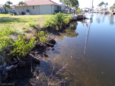 This lot is on a DIRECT ACCESS SAILBOAT CANAL This lot also has on Saint Andrews South Golf Club in Florida - for sale on GolfHomes.com, golf home, golf lot