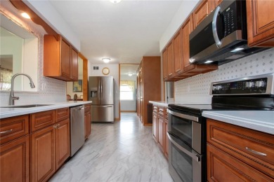 Updated Home with 3 Full Sized Bedrooms - all with walk in on North Lakes Golf Course in Florida - for sale on GolfHomes.com, golf home, golf lot
