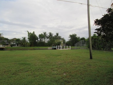 HUGE CORNER LOT PROPERTY WITH A PRIVATE DOCK & WITH A BEAUTIFUL on Cypress Creek Country Club - Boynton Beach in Florida - for sale on GolfHomes.com, golf home, golf lot