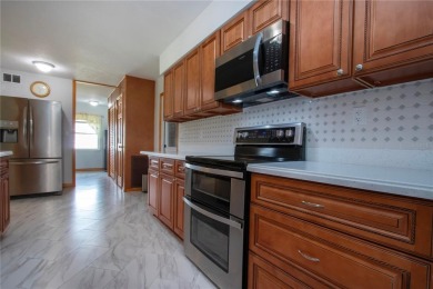 Updated Home with 3 Full Sized Bedrooms - all with walk in on North Lakes Golf Course in Florida - for sale on GolfHomes.com, golf home, golf lot