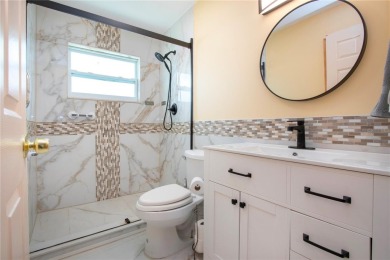 Updated Home with 3 Full Sized Bedrooms - all with walk in on North Lakes Golf Course in Florida - for sale on GolfHomes.com, golf home, golf lot