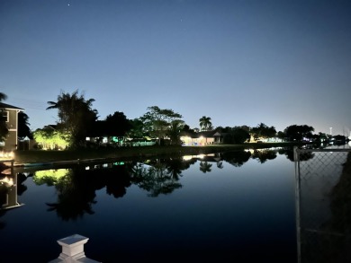 HUGE CORNER LOT PROPERTY WITH A PRIVATE DOCK & WITH A BEAUTIFUL on Cypress Creek Country Club - Boynton Beach in Florida - for sale on GolfHomes.com, golf home, golf lot