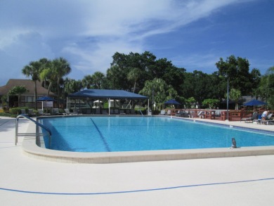 HUGE CORNER LOT PROPERTY WITH A PRIVATE DOCK & WITH A BEAUTIFUL on Cypress Creek Country Club - Boynton Beach in Florida - for sale on GolfHomes.com, golf home, golf lot