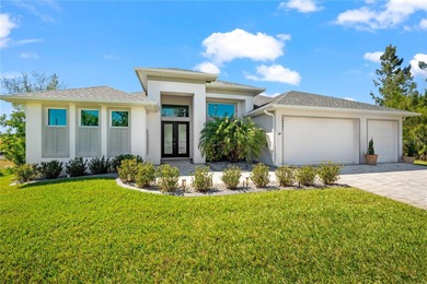 Live the Florida Dream! This stunning custom-built waterfront on Rotonda Golf and Country Club - Long Marsh  in Florida - for sale on GolfHomes.com, golf home, golf lot