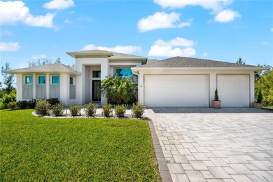Live the Florida Dream! This stunning custom-built waterfront on Rotonda Golf and Country Club - Long Marsh  in Florida - for sale on GolfHomes.com, golf home, golf lot
