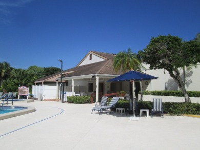 HUGE CORNER LOT PROPERTY WITH A PRIVATE DOCK & WITH A BEAUTIFUL on Cypress Creek Country Club - Boynton Beach in Florida - for sale on GolfHomes.com, golf home, golf lot