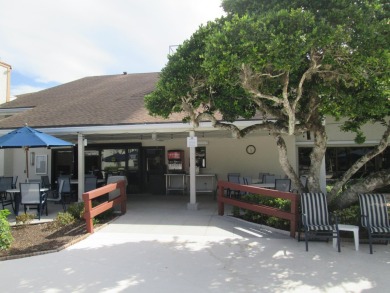 HUGE CORNER LOT PROPERTY WITH A PRIVATE DOCK & WITH A BEAUTIFUL on Cypress Creek Country Club - Boynton Beach in Florida - for sale on GolfHomes.com, golf home, golf lot