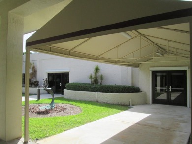 HUGE CORNER LOT PROPERTY WITH A PRIVATE DOCK & WITH A BEAUTIFUL on Cypress Creek Country Club - Boynton Beach in Florida - for sale on GolfHomes.com, golf home, golf lot