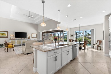 Live the Florida Dream! This stunning custom-built waterfront on Rotonda Golf and Country Club - Long Marsh  in Florida - for sale on GolfHomes.com, golf home, golf lot