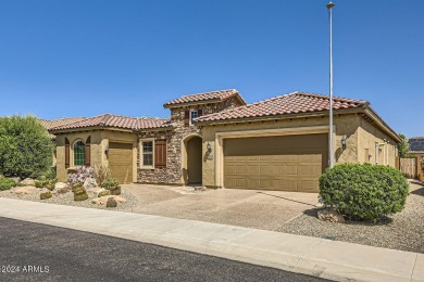 This 2-bed, 2.5-bath, 2-den Journey model is a wonderful way to on Copper Canyon Golf Club in Arizona - for sale on GolfHomes.com, golf home, golf lot