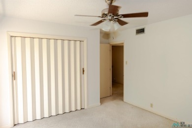 This well-maintained townhome boasts beautiful views of the golf on Chaparral Country Club in New Mexico - for sale on GolfHomes.com, golf home, golf lot