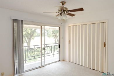 This well-maintained townhome boasts beautiful views of the golf on Chaparral Country Club in New Mexico - for sale on GolfHomes.com, golf home, golf lot