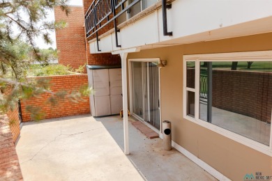 This well-maintained townhome boasts beautiful views of the golf on Chaparral Country Club in New Mexico - for sale on GolfHomes.com, golf home, golf lot