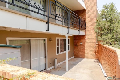 This well-maintained townhome boasts beautiful views of the golf on Chaparral Country Club in New Mexico - for sale on GolfHomes.com, golf home, golf lot