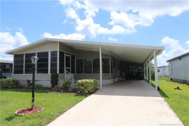 Golf cart & BBQ grill are included in the sale. A/C unit is only on Indianwood Golf and Country Club in Florida - for sale on GolfHomes.com, golf home, golf lot