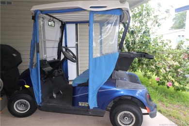 Golf cart & BBQ grill are included in the sale. A/C unit is only on Indianwood Golf and Country Club in Florida - for sale on GolfHomes.com, golf home, golf lot