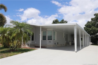 NO POPCORN CEILINGS HERE! This pristine clean unfurnished home on Indianwood Golf and Country Club in Florida - for sale on GolfHomes.com, golf home, golf lot